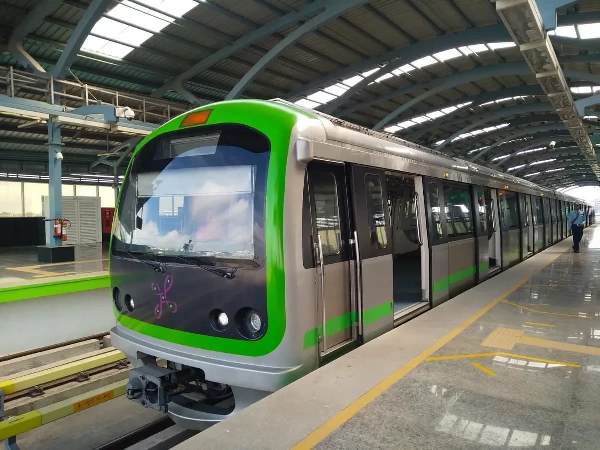 A modern metro train arriving at a station, representing the fast commute and connectivity for nearby residential projects.
